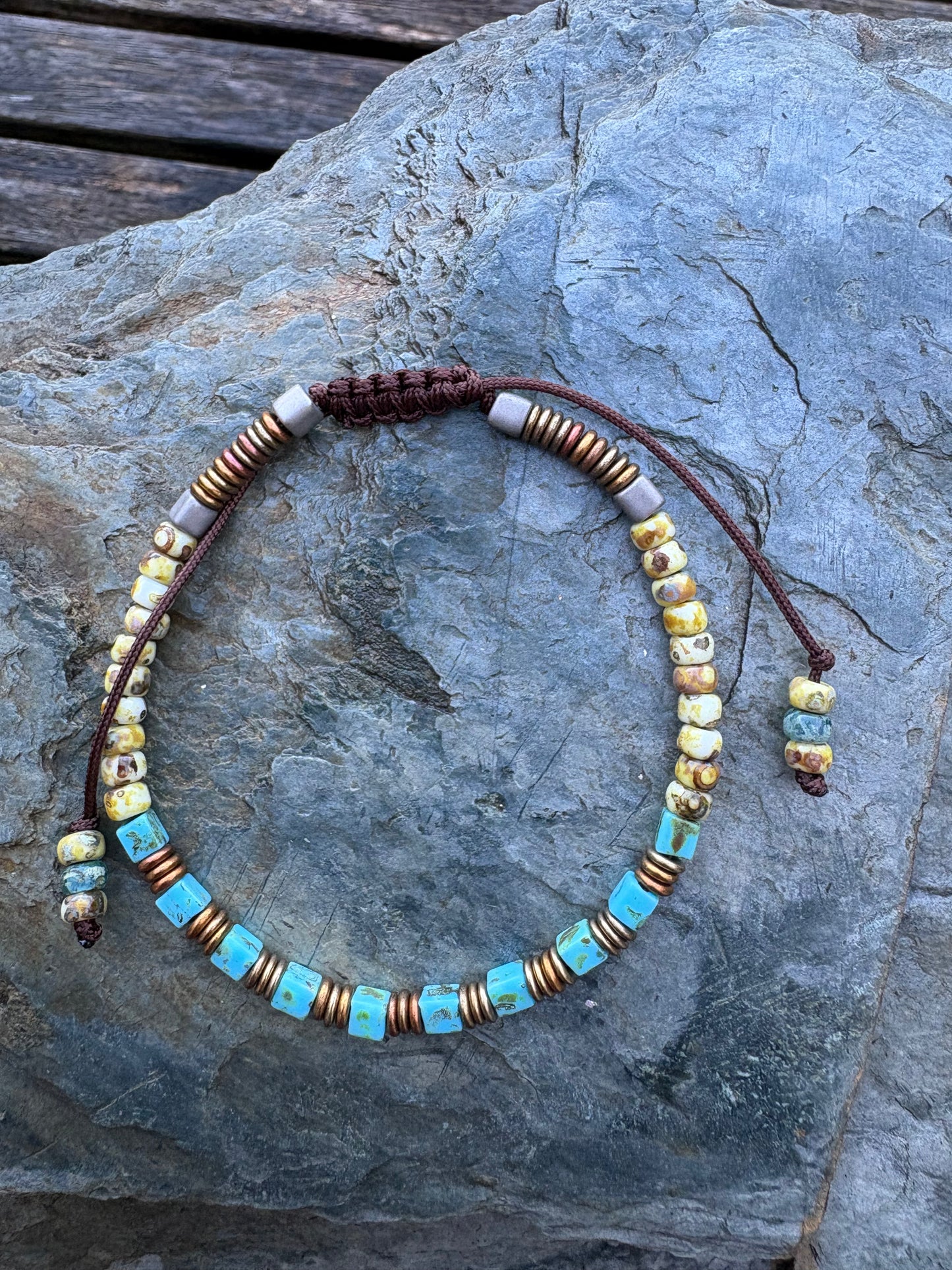 A turquoise macrame bracelet